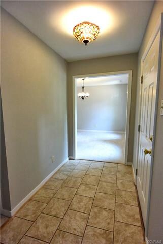 Foyer with ceramic tile for years of durability an