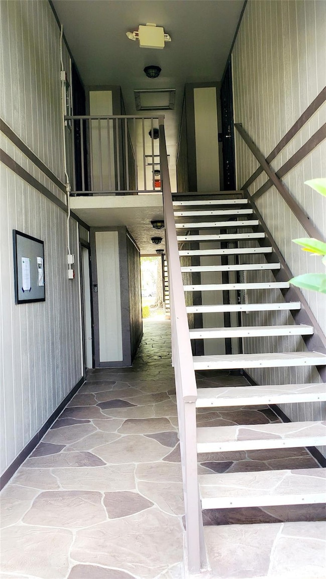 Stairs to Property. First door on the Left.