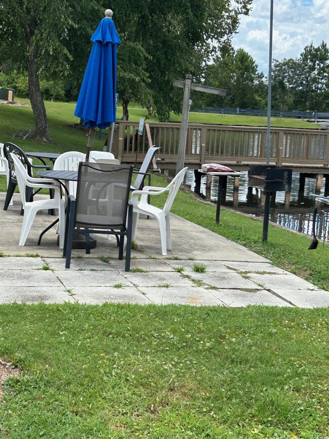 View of patio featuring outdoor dining space