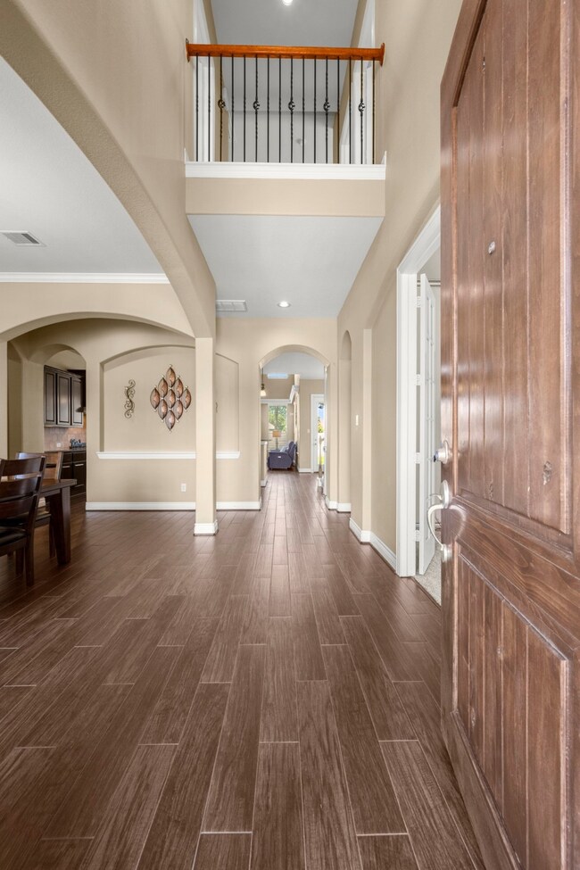 Entry opens to the dining room and looks to the living areas.
