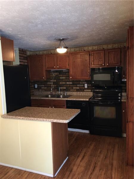 Breakfast Island flowing into new updated Kitchen.