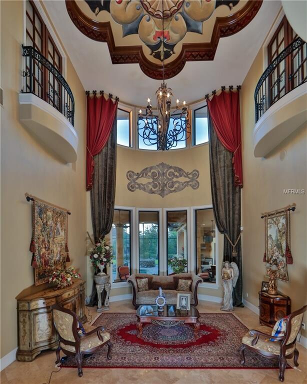 Dramatic entry overlooking 24 foot ceilings and a 