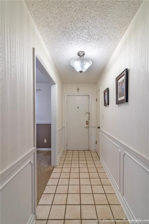 Front entry features ceramic tile flooring.
