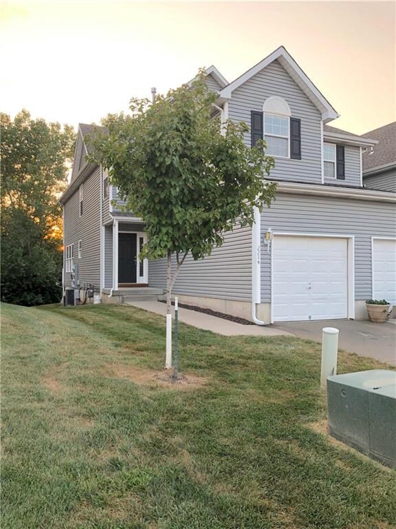 Side of home. HOA provides lawn maintenance, snow 