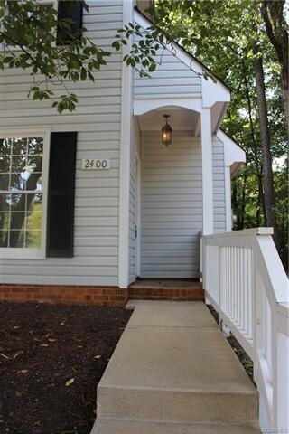 Front pathway and fence leading to front door