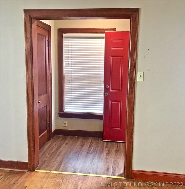 A red front door (traditional symbol of hospitalit