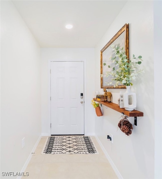 Entryway featuring tile patterned floors