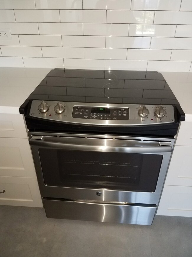 Smooth surface range with oven and warming drawer