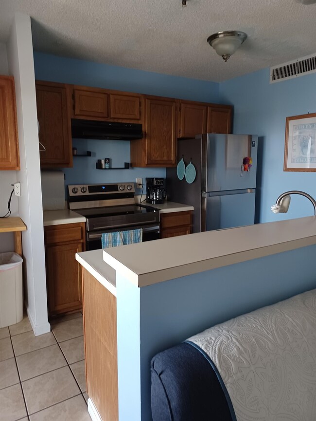 Kitchen featuring appliances with stainless steel 