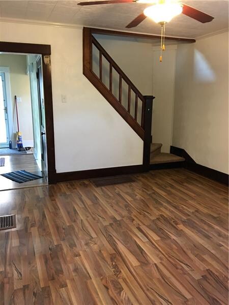 Living room leading to second floor