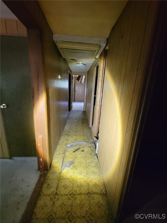 Corridor with wood walls