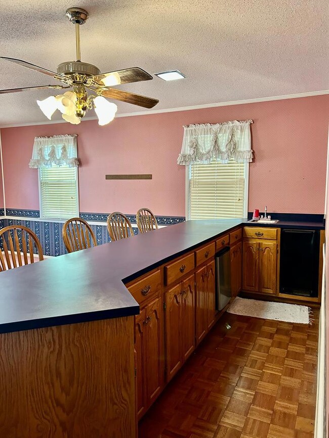 Large bar with mini fridge and ice maker 