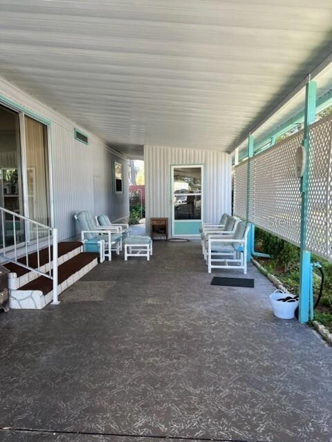 Carport Area/Large area for extra seating to relax