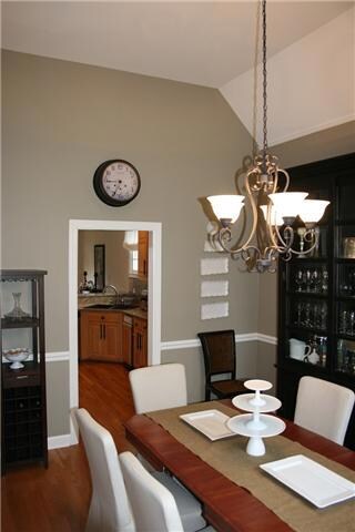 Formal dining room with vaulted ceiling 