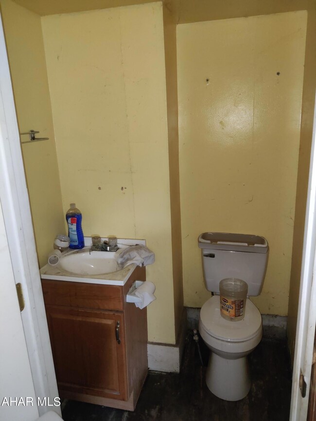 Half Bath on 1st Floor off Dining Room