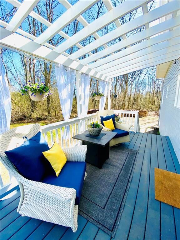 Beautiful outdoor living space with a wraparound d