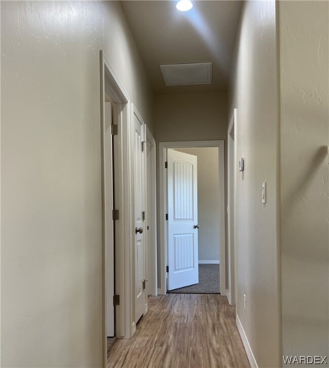 Hall with hardwood floors