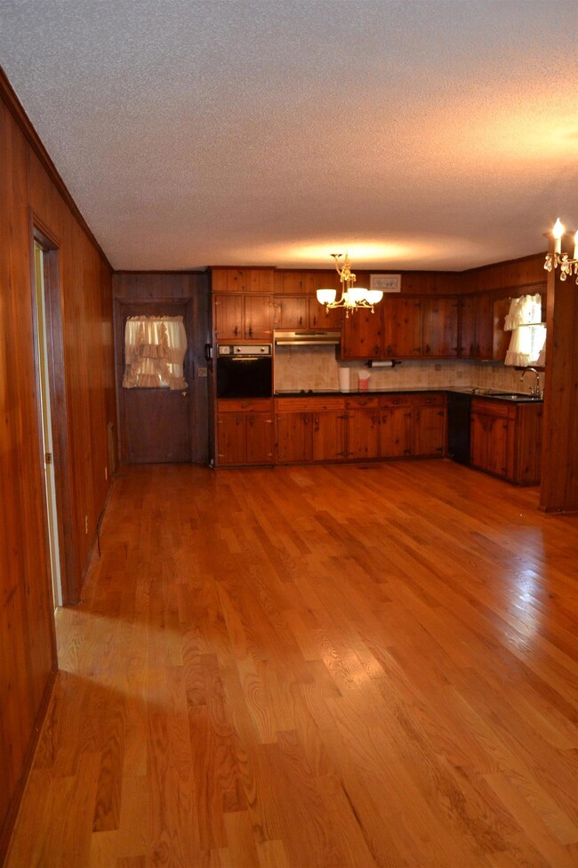View of kitchen/dining room from hallway. 