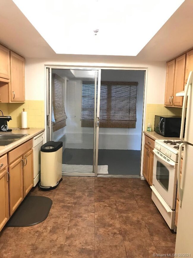 Kitchen opens to Florida Room