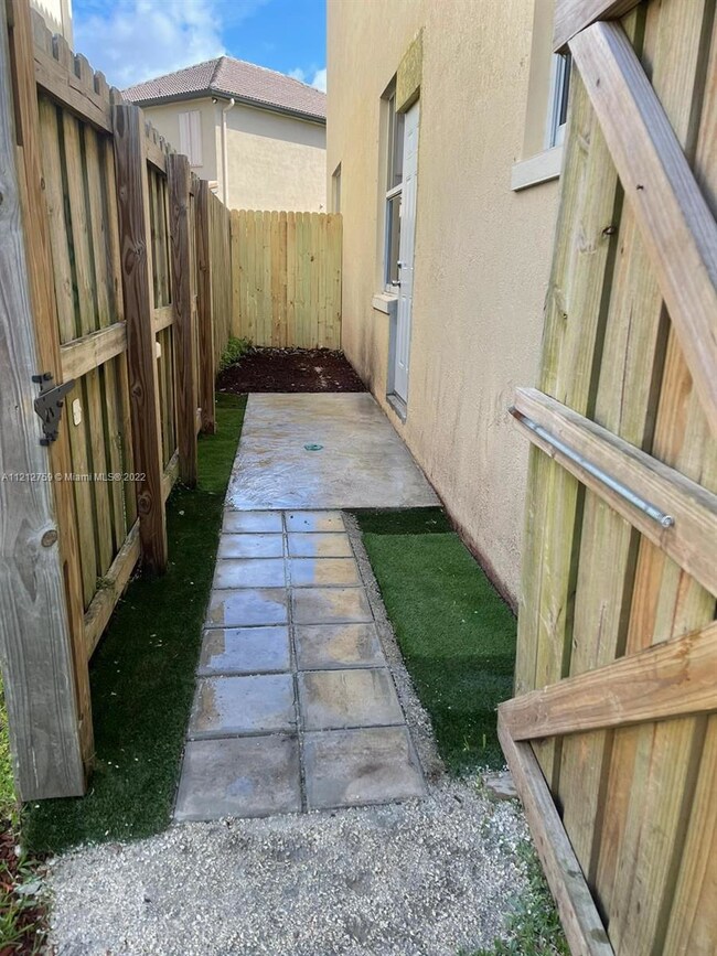 Paved entrance to unit