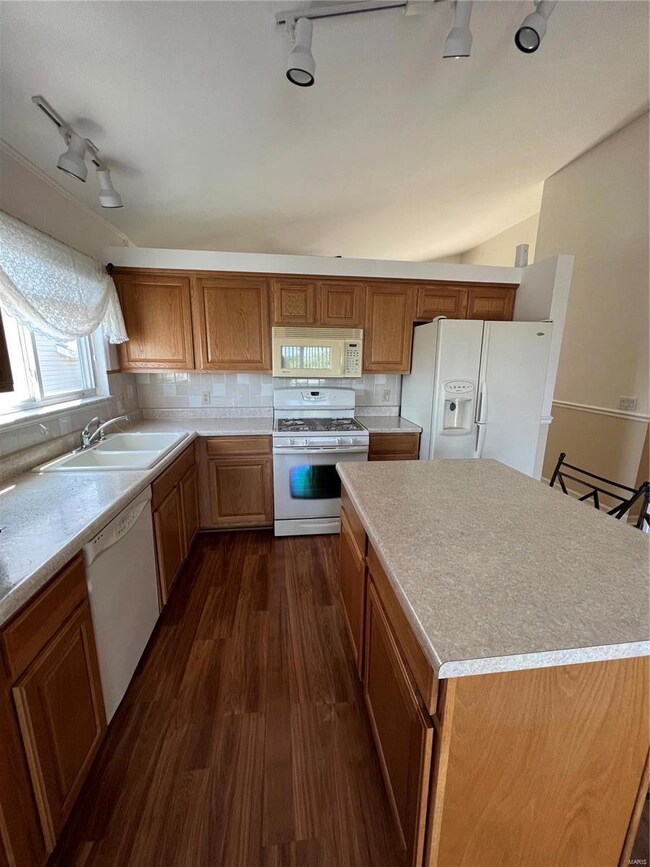 Lots of countertop space and cabinets plus a pantr