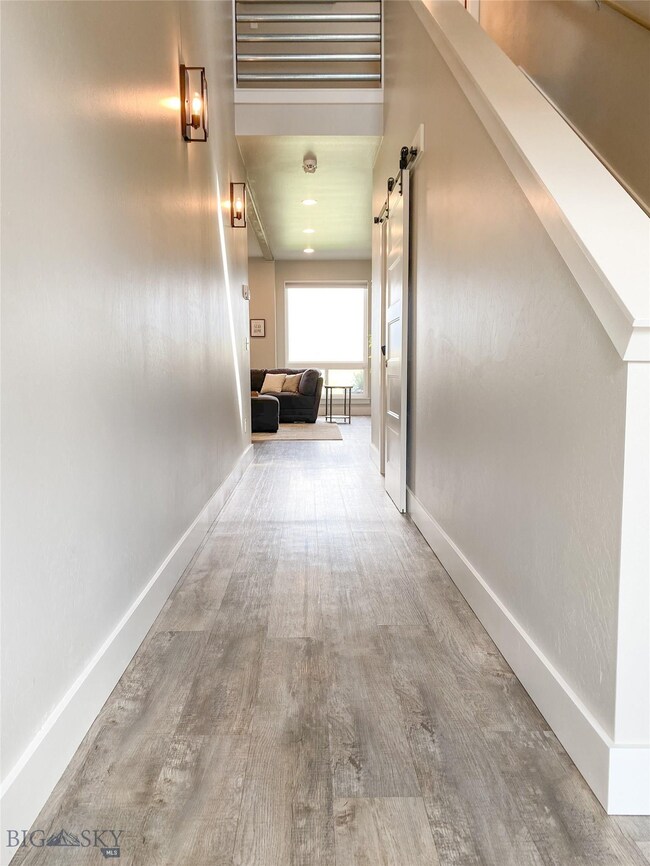 Entry hall adjacent to staircase to 2nd level