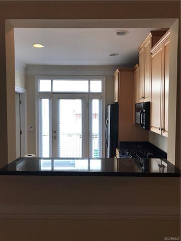 Breakfast bar looking into the kitchen