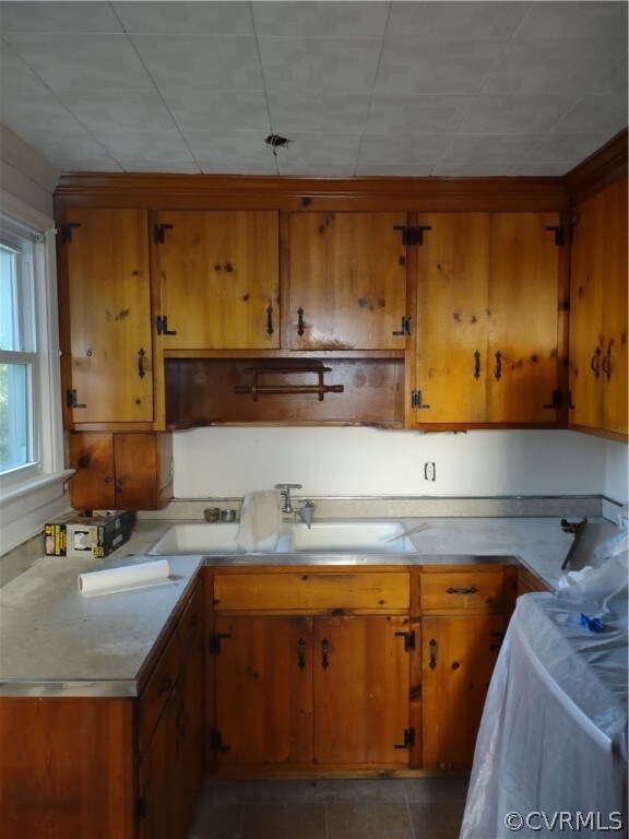 Kitchen is dated and should be replaced.