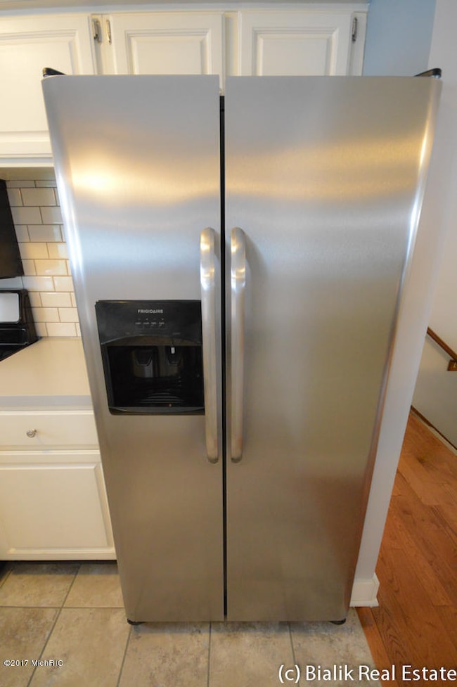 928 Woodspointe Dr SW, Byron Center, MI 49315 - photo 2