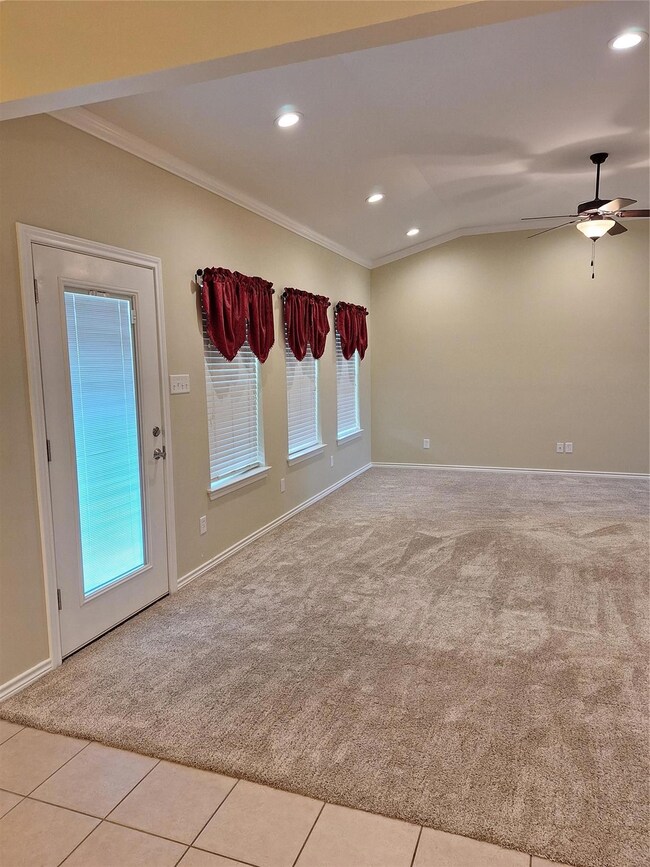 Family room featuring ceiling fan, carpet floors, 