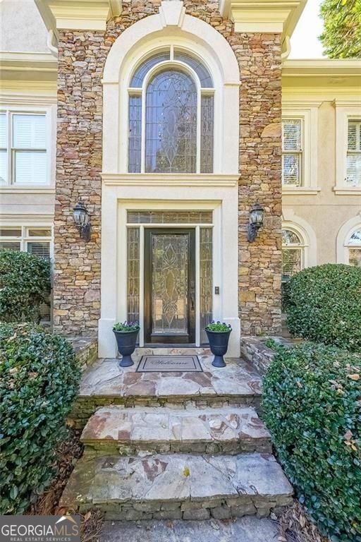 Grand stacked stone entry.