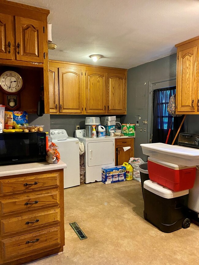 Laundry hook up in kitchen