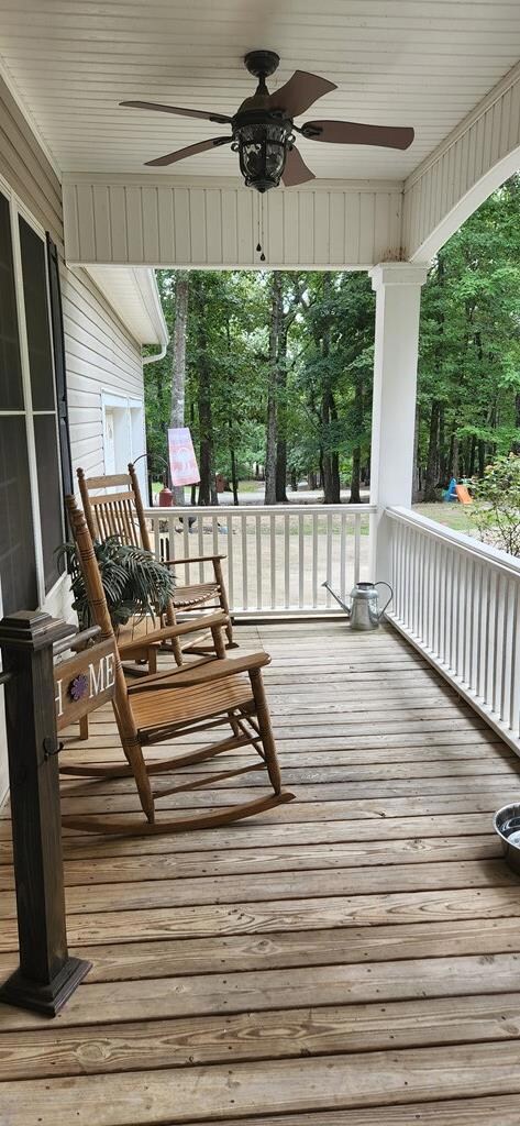 Covered front porch with ceiling fan