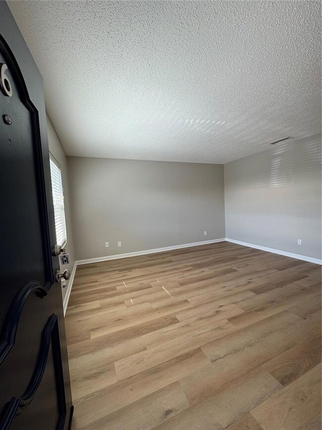 Entrance into to open living/dining room