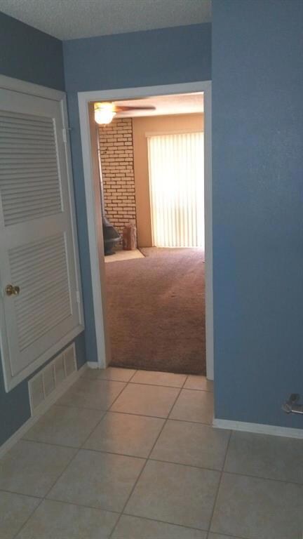 ENTRYWAY - TO DEN AND SEPARATE LIVING AR