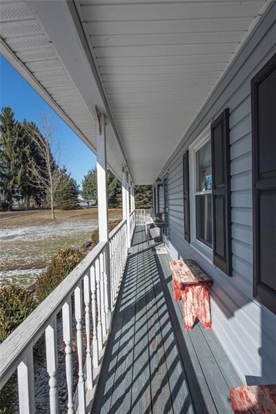 Enjoy summer evenings on the covered front porch.