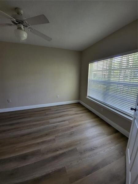 Window view of garden/green space in back ...quiet and private area of community