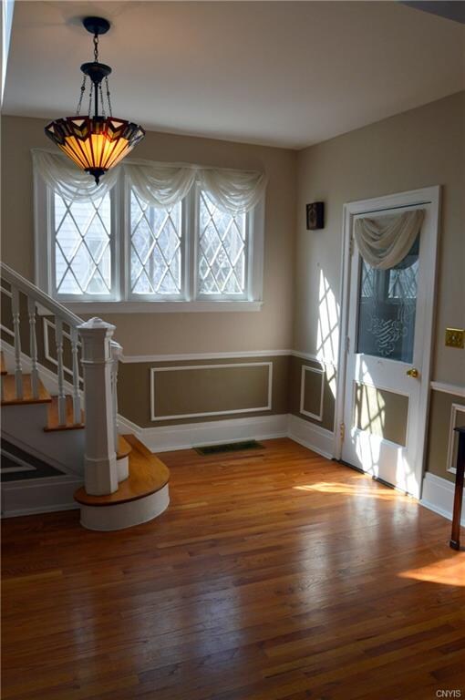 Foyer with original lead glass window