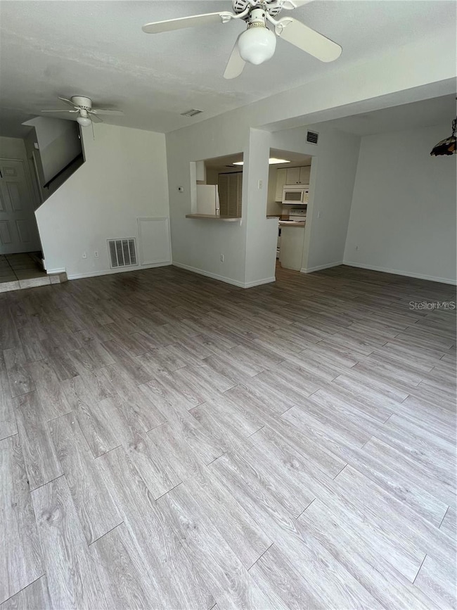 Open view living room and dining room