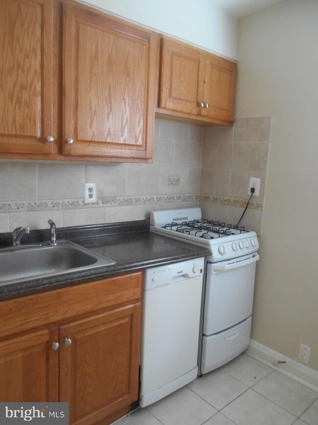 1101 Gleneagle Rd unit 1ST FLOOR, Baltimore, MD 21239 - photo 2