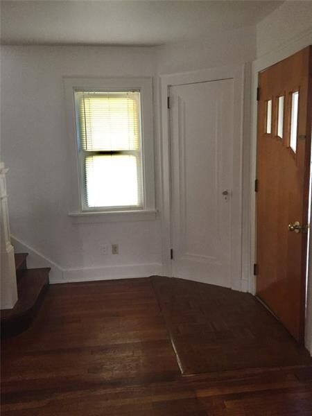 Front entrance with a coat closet.