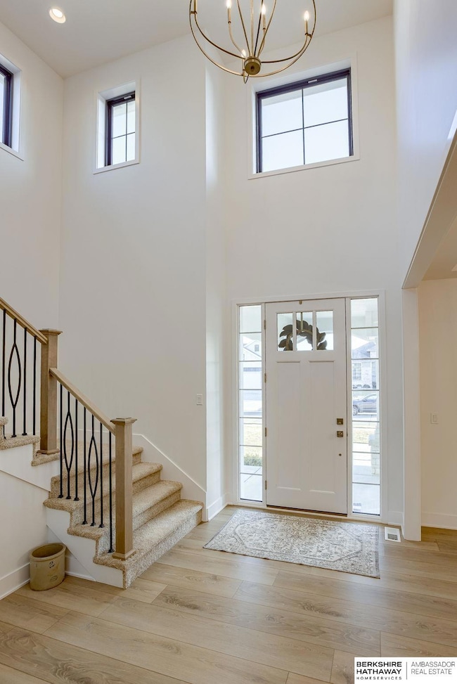 The colors and finishes in this home are warm and inviting.  LVP flooring throughout the main floor.