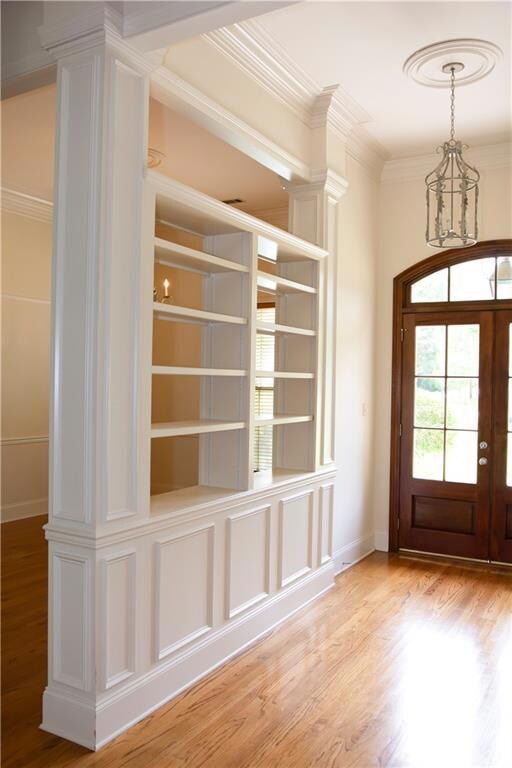 Foyer opens into Living Room and into formal Dinin