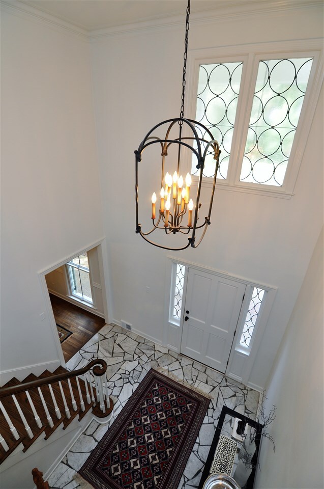 Step inside to a beautiful 2-story foyer with tile