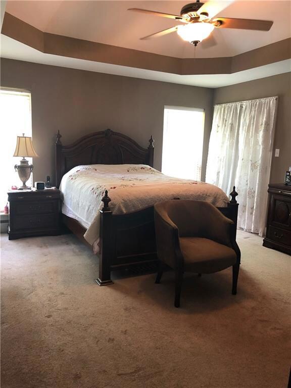 Large Master Bedroom with tray ceilings and ceilin