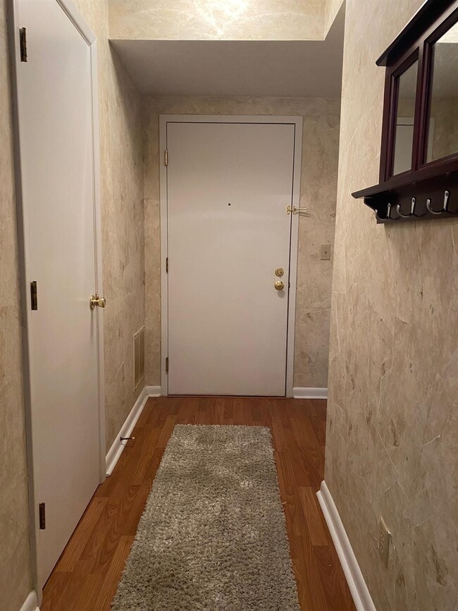 There is a welcoming entry with laminate flooring and a coat closet.