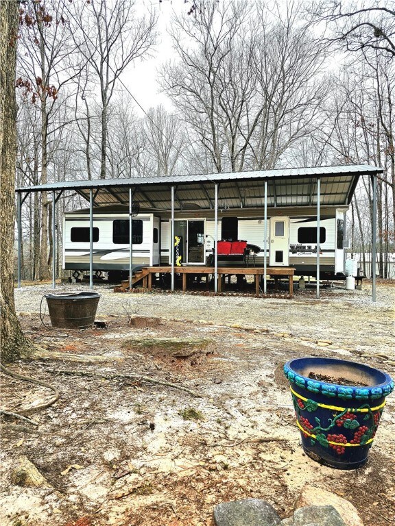 Camper with RV carport
