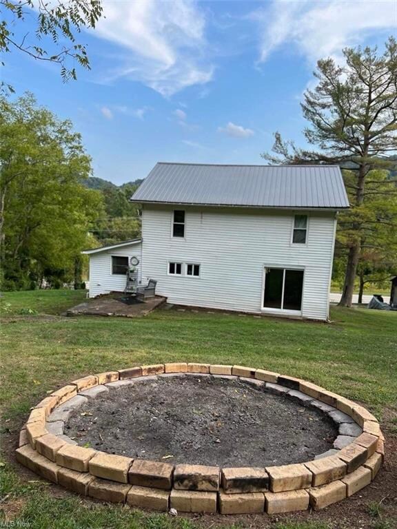 House and 8ft. fire ring