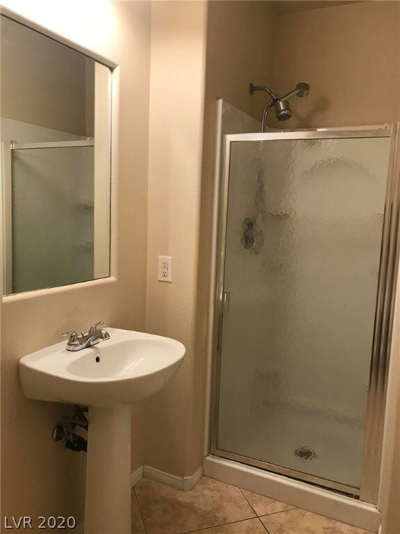 Shower with Bedroom down stair.