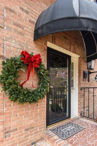 front entrance, note fabric awning